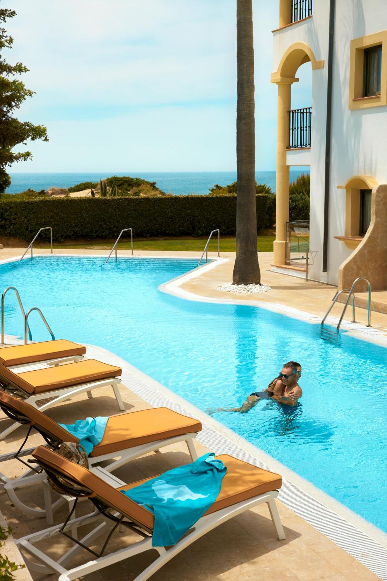 Iberostar Selection Andalucia Playa Hotel Chiclana de la Frontera Exterior foto A swimming pool
